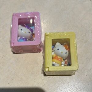 Hello Kitty Mini Figurines in Pink and Yellow Cases 2